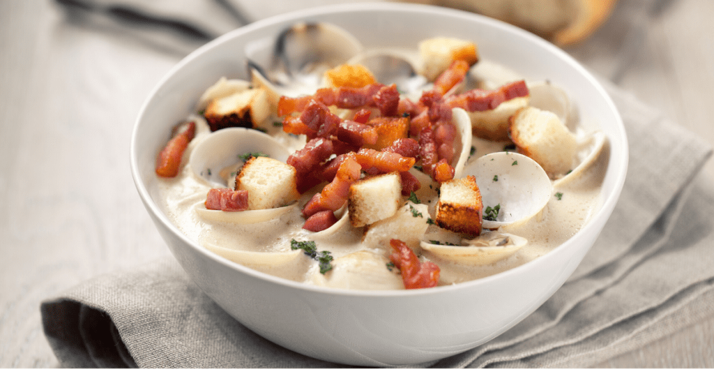 Bowl of Clam Chowder with Bacon Bits and Croutons