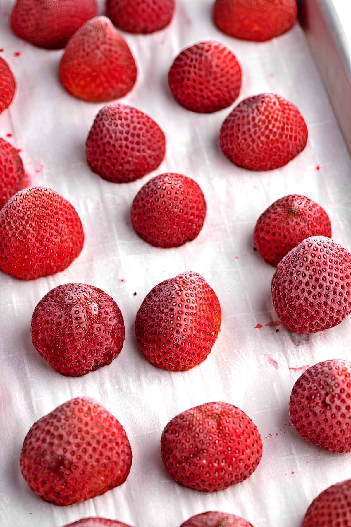 Frozen Strawberries on a Baking Sheet