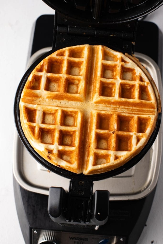 Waffle in a waffle maker.