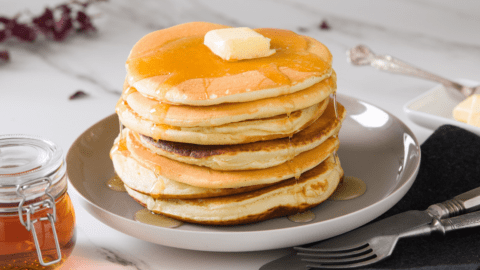 Homemade Cracker Barrel Pancakes With Butter and Maple Syrup