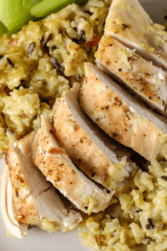 No Peek Chicken and rice casserole has just 5 incredients. A bed of creamy, flavorful rice is topped with tender chicken. 