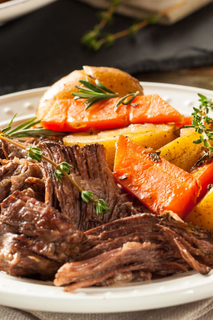 This tender pot roast is comfort food at its best. Potatoes, carrots, celery, and savory chuck roast smothered in a rich and delicious gravy. 