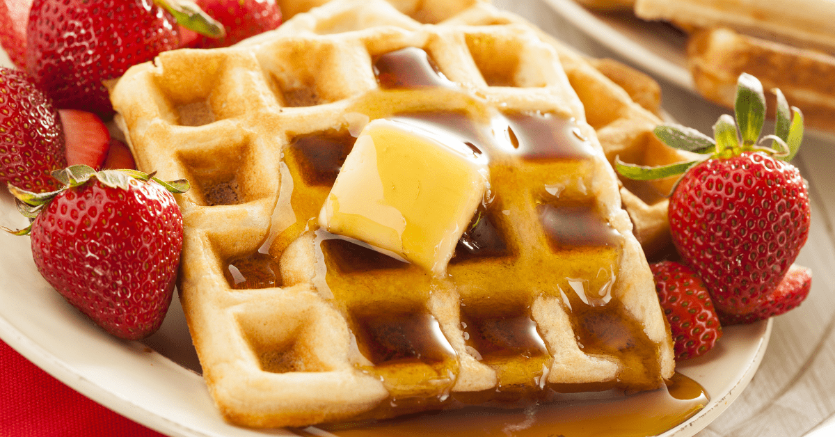 Homemade Waffles with Butter, Strawberry and Honey