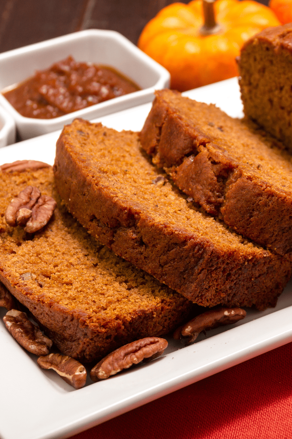 Sliced pumpkin bread with nuts. 