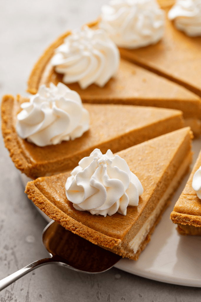 Double Layered Pumpkin Cheesecake Pie with Whipped Cream