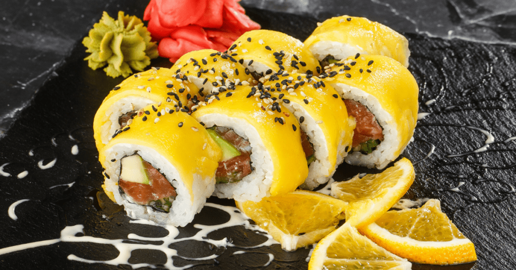 Sushi Rolls with Mango on Top