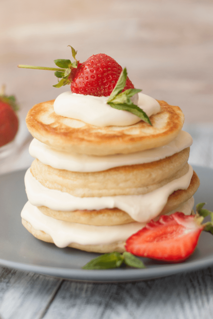 Sweet Pancakes with Cream and Strawberry