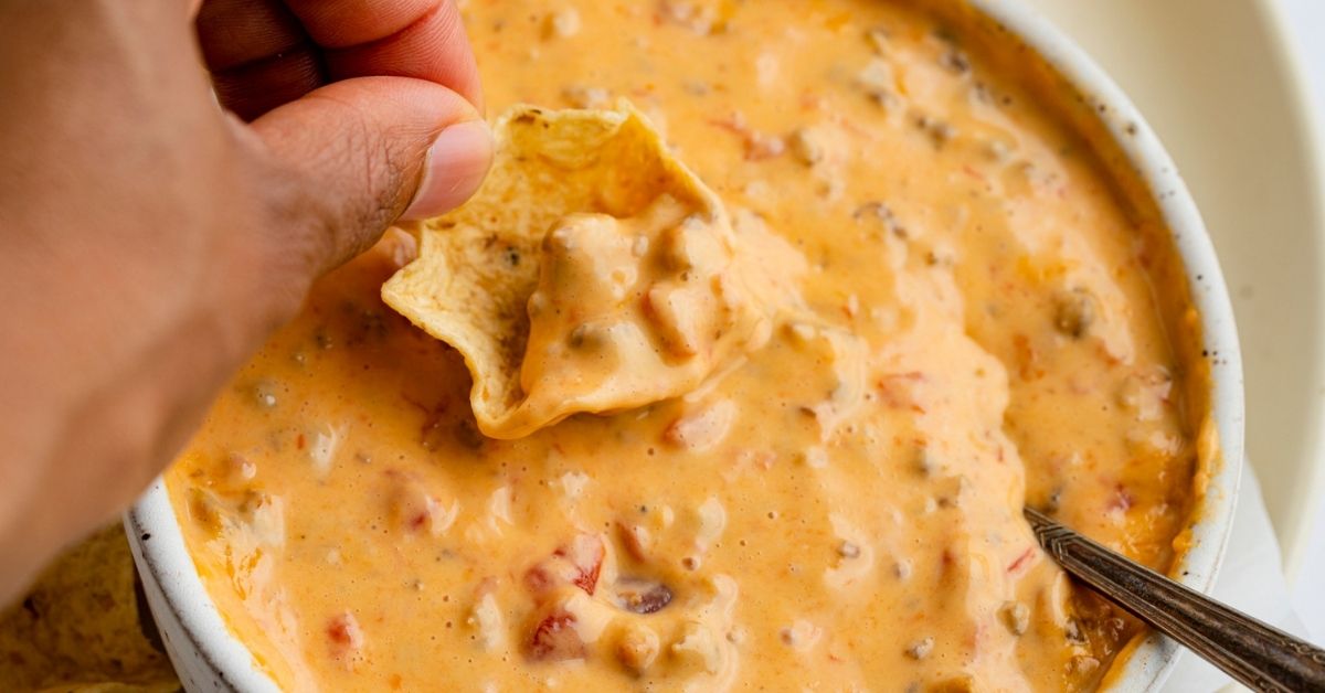 https://insanelygoodrecipes.com/wp-content/uploads/2020/11/Homemade-Creamy-and-Cheesy-Velveeta-Sausage-Dip-with-Tortilla-Chips.jpg