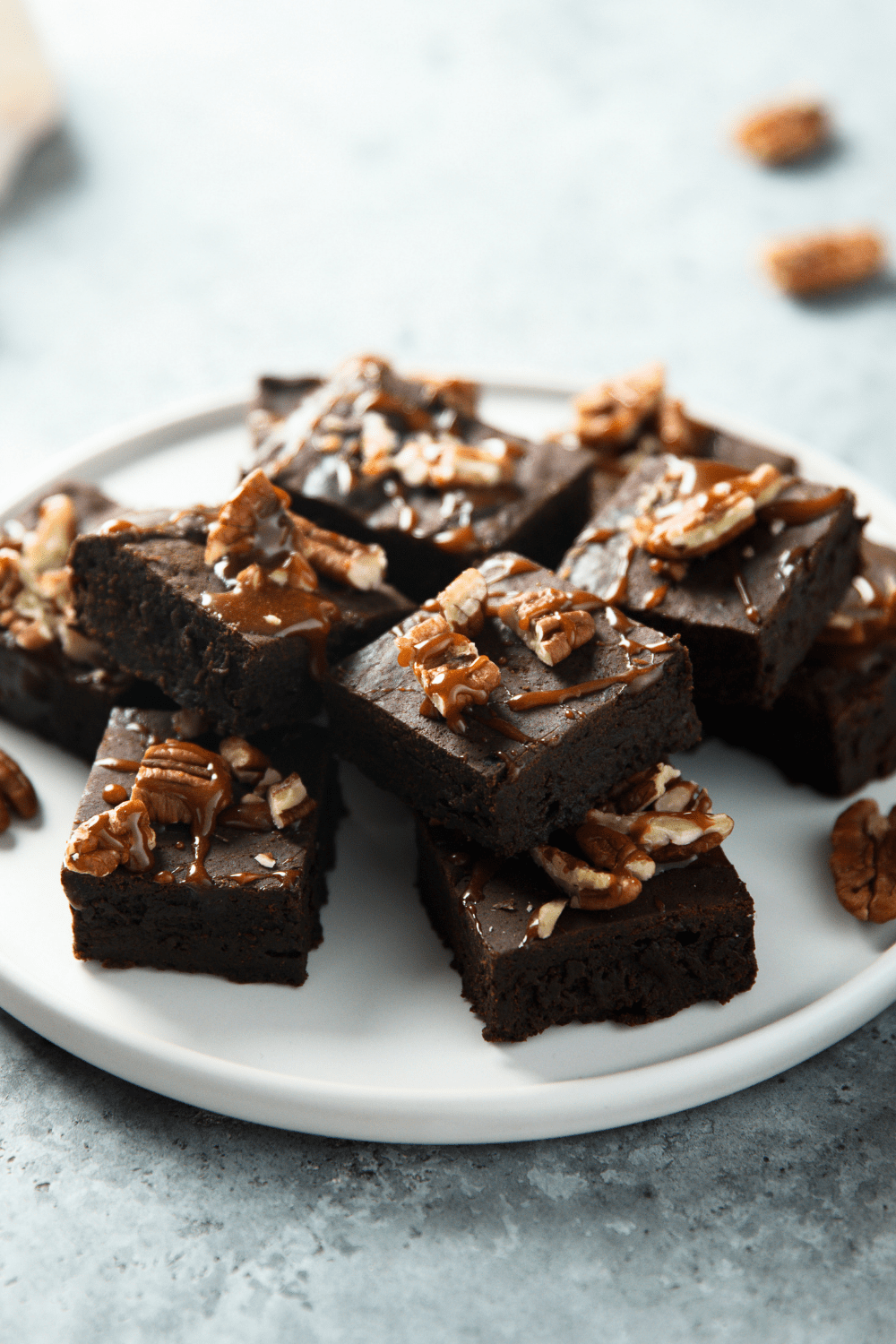 Sweet Homemade Fudge Brownies with Walnuts in a White Plate