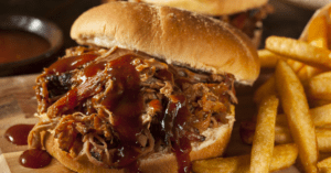 Homemade Pulled Pork Sandwich with Fries and Sauce