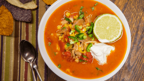 Homemade Tortilla Soup with Sour Cream and Lemon