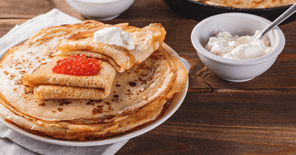 https://insanelygoodrecipes.com/wp-content/uploads/2020/11/Traditional-Russian-Crepes-Blini.png