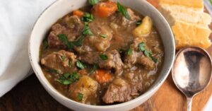 Warm and Hearty Homemade Old-Fashioned Beef Stew with Vegetables and Bread