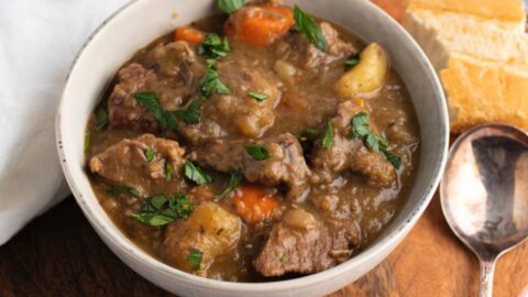 Warm and Hearty Homemade Old-Fashioned Beef Stew with Vegetables and Bread