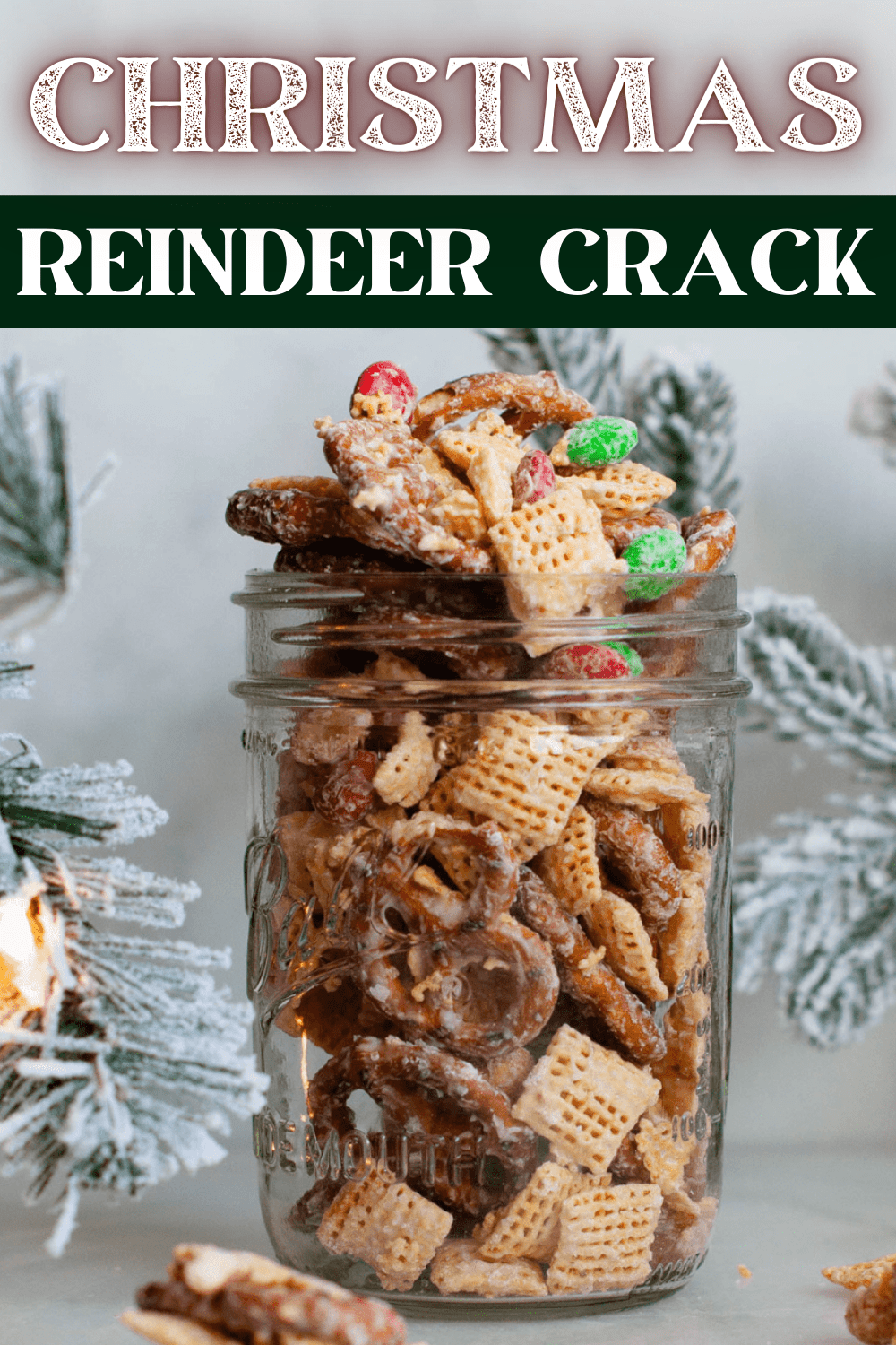 A Glass of Christmas Reindeer Crack Made With Mix of Pretzels, Chex and M&M's. 