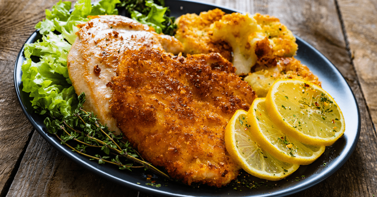 Homemade German Schnitzel with Lemons and Potatoes