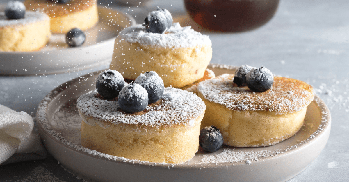 Homemade Japanese Pancakes with Powdered Sugar and Blueberries