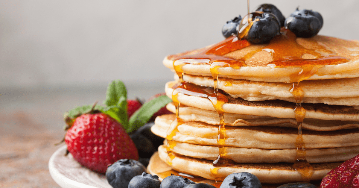 Pancakes with Berries and Maple Syrup