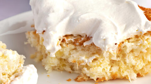 A Slice of Pineapple Angel Food Cake with a Fork