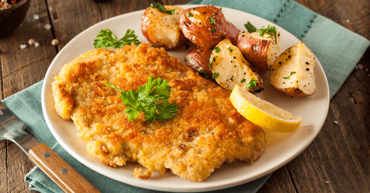 Breaded Chicken with Potatoes and Lemons