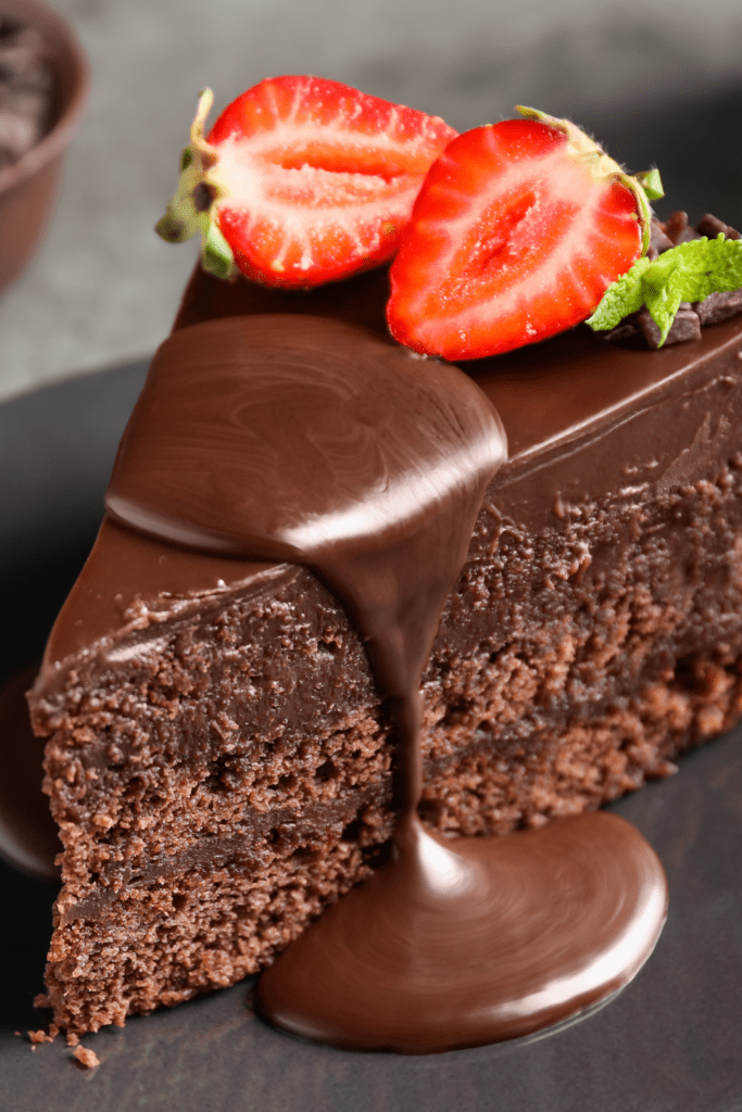 Chocolate Cake With Strawberry And Chocolate Syrup