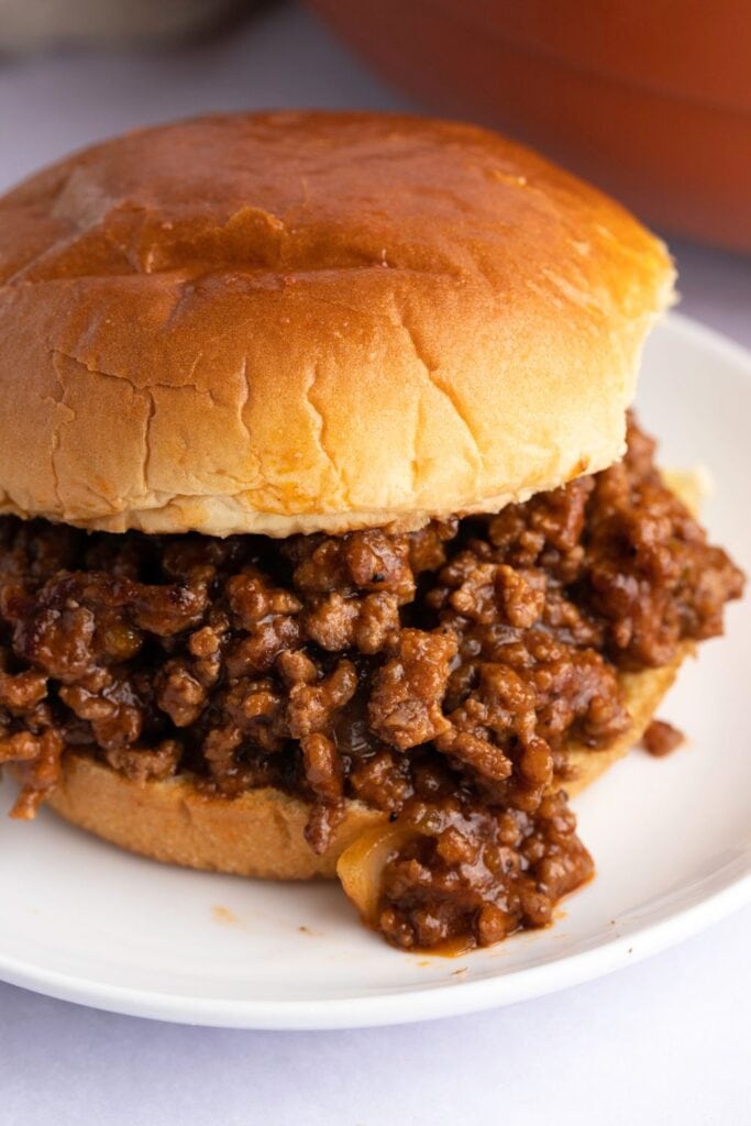 Homemade Sloppy Joes with ground beef, hamburger buns and onions
