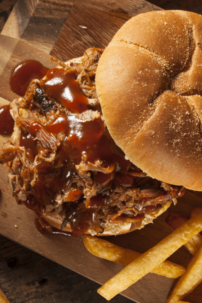 Pulled Pork Sandwich with BBQ Sauce and Fries