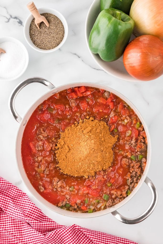 Wendy's chili with chili spice mix in a large pot, top view