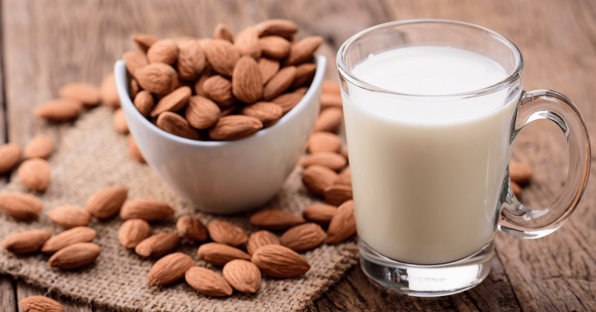 Almond Milk in a Glass with Almonds