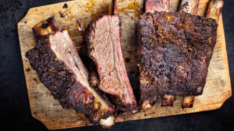 Barbecue Chuck Beef Ribs in a Wooden Cutting Board