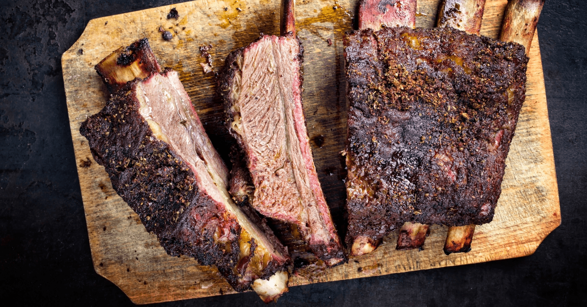 Barbecue Chuck Beef Ribs in a Wooden Cutting Board