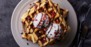 Belgian Waffles with Chocolate Syrup and Ice Cream