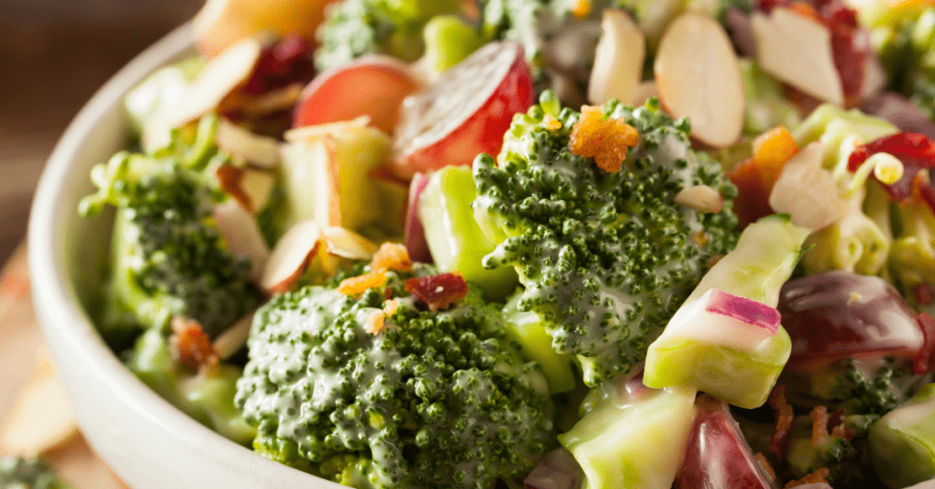 Bowl of Creamy Broccoli Salad with Grapes and Bacon