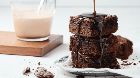Chocolate Brownies with Chocolate Syrup Paired with Coffee