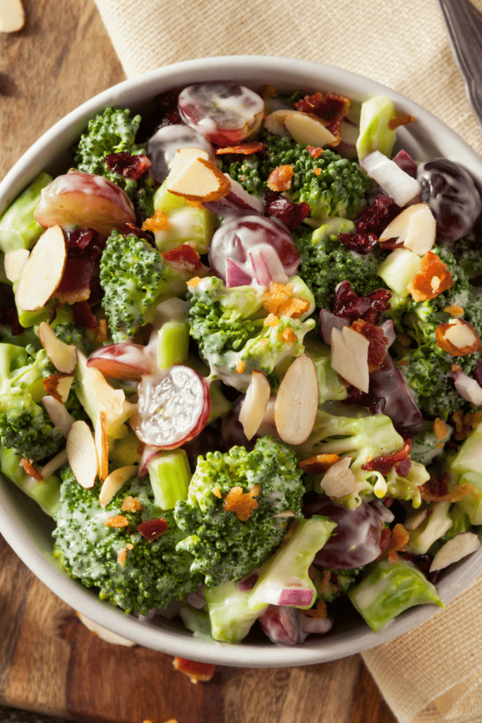 Creamy Broccoli Salad with Grapes, Raisins, and Bacon