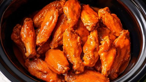 An overhead view of crockpot buffalo chicken wings.
