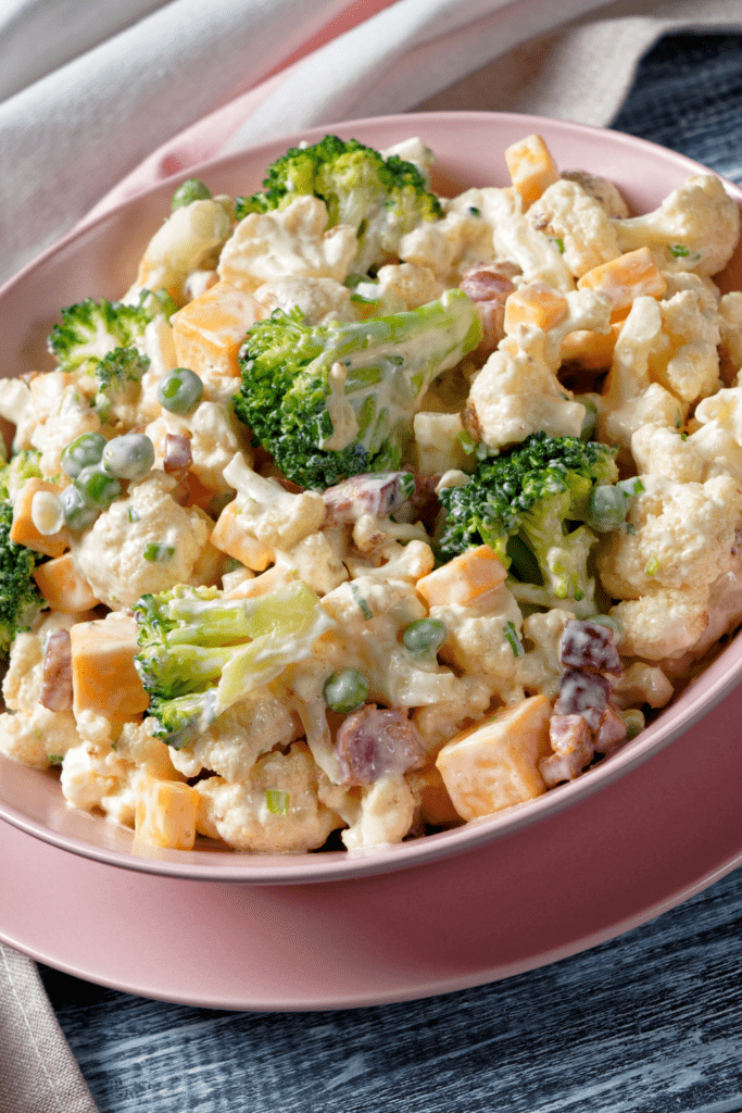 Creamy Broccoli Salad with Cauliflower, Bacon and Sweet Peas
