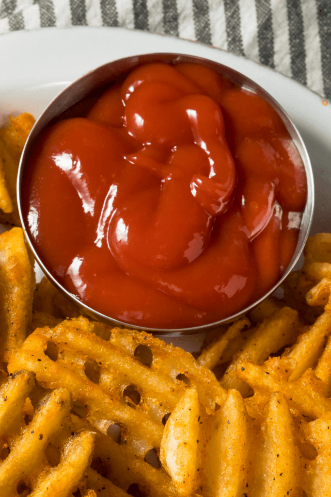 Homemade Ketchup with Waffle French Fries in a Plate