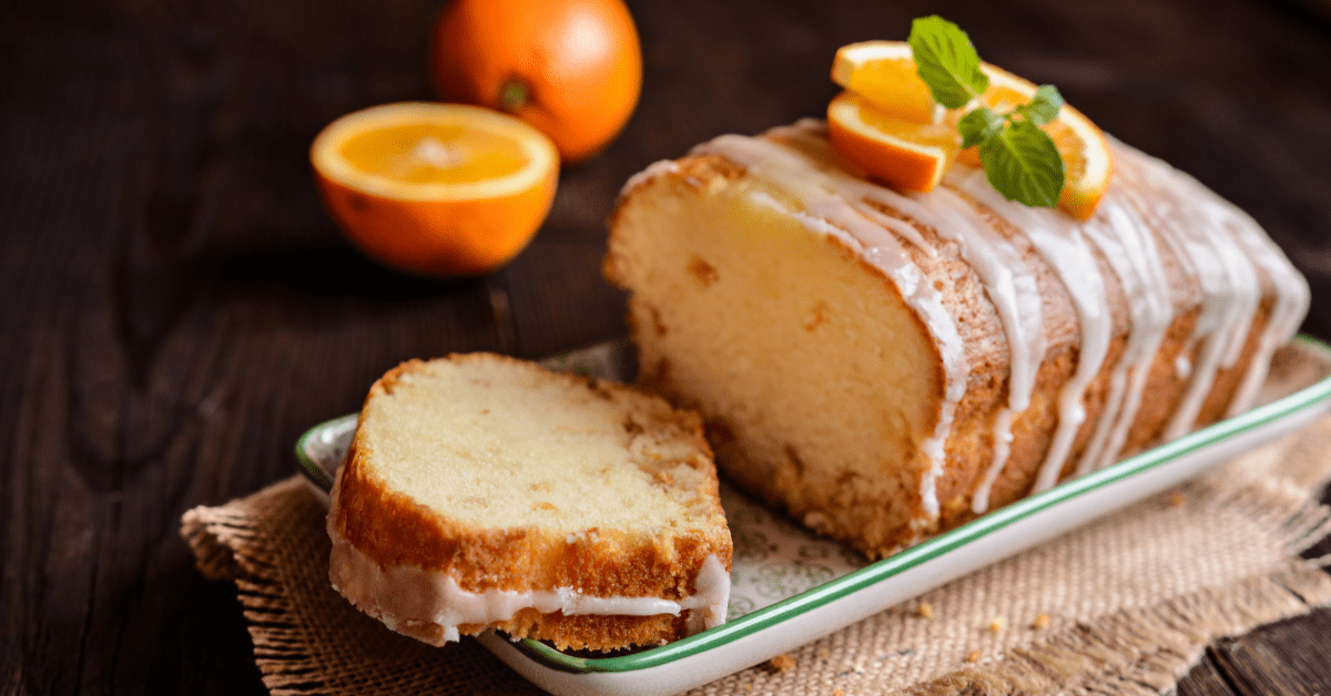 Homemade Orange Pound Cake with Sugar Glaze and Fresh Oranges