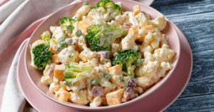 Homemade Creamy and Broccoli and Cauliflower Salad with Peas and Bacon