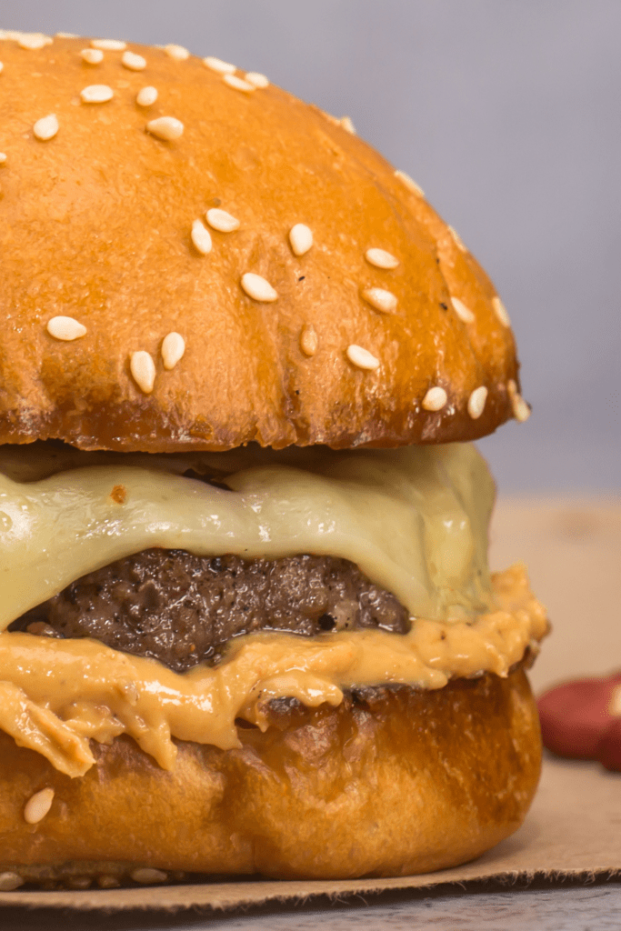 Peanut Butter Burger with Melted Cheese and Sesame Seeds