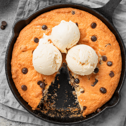 https://insanelygoodrecipes.com/wp-content/uploads/2021/02/Skillet-Cookie-with-Chocolate-Chips-and-Ice-Cream-500x500.png