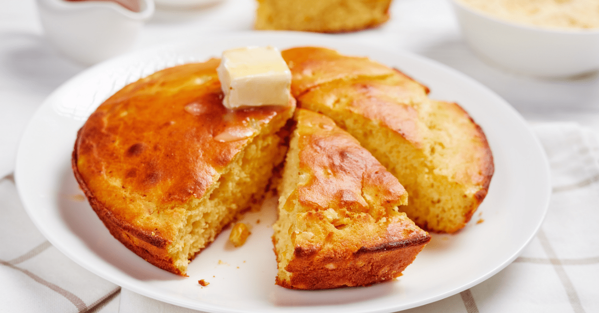 Slices of Homemade Cornbread Topped with Melted Butter