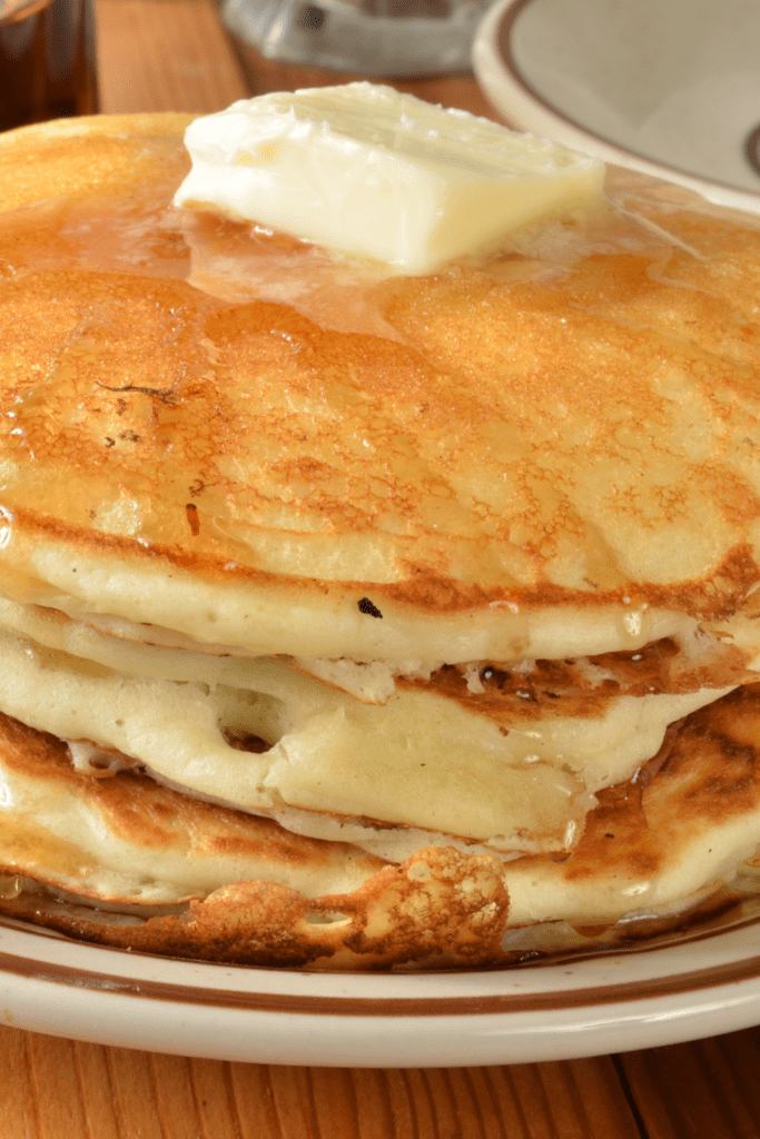 Buttermilk Pancakes with Melted Butter and Syrup
