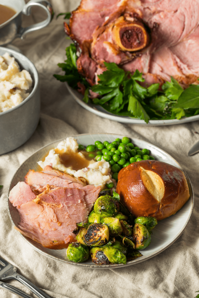 Easter Glazed Ham with Brussels Sprouts, Dinner Rolls and Mashed Potatoes