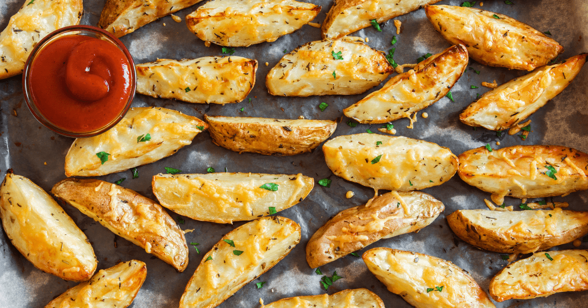 Homemade Baked Potato Wedges with Herbs and Tomato Sauce