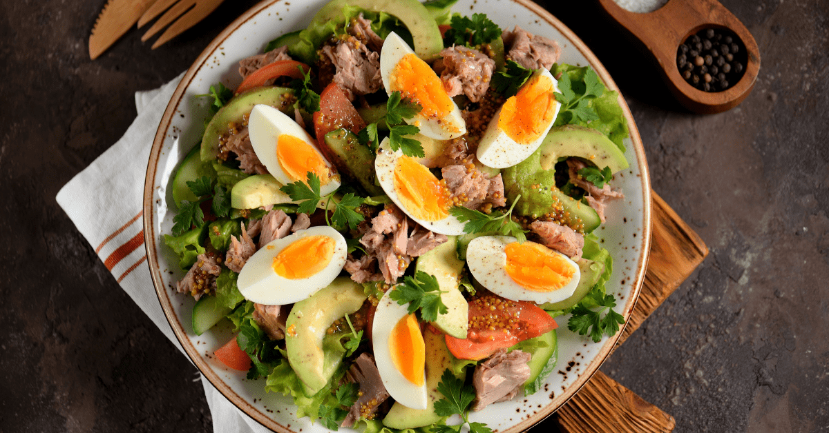Homemade Salad with Canned Tuna, Egg, Avocadoes, Lettuce and Tomatoes