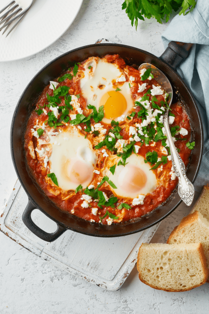 Baked Eggs in a Sauce of Tomatoes with Bread