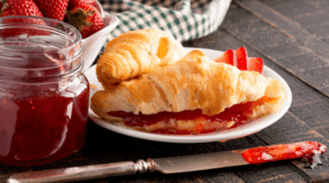 Croissants Filled with Strawberry Jam and Fresh Strawberries