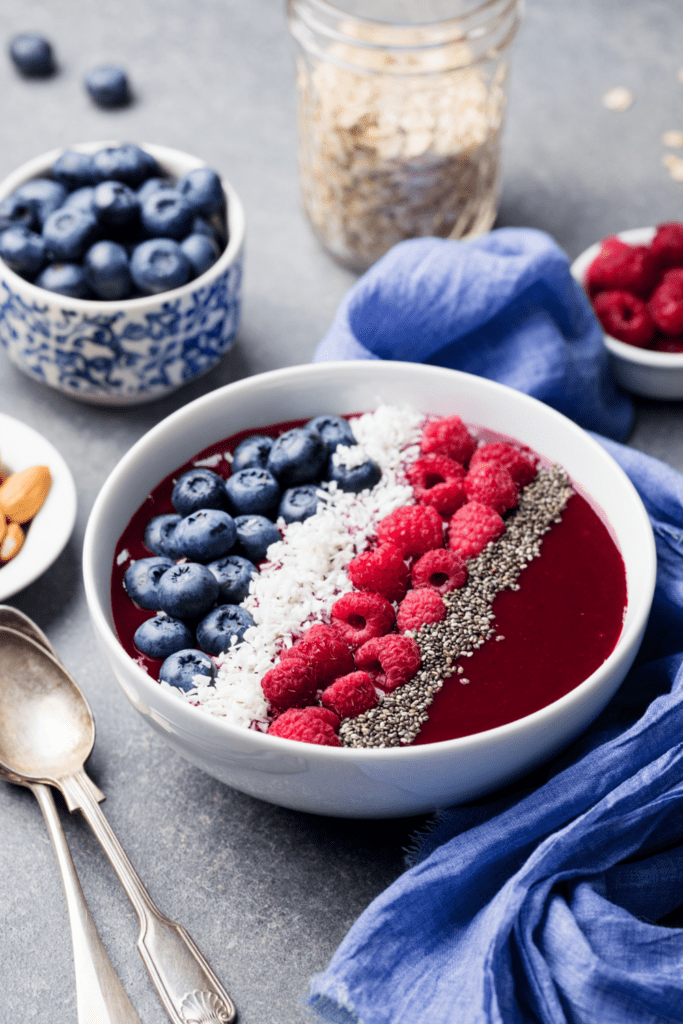 Smoothie Bowl with Berries, Coconut Flakes and Chia Seeds